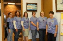 Our Tellers and Receptionist painting the town Purple with our Cancer Awareness t-shirts!